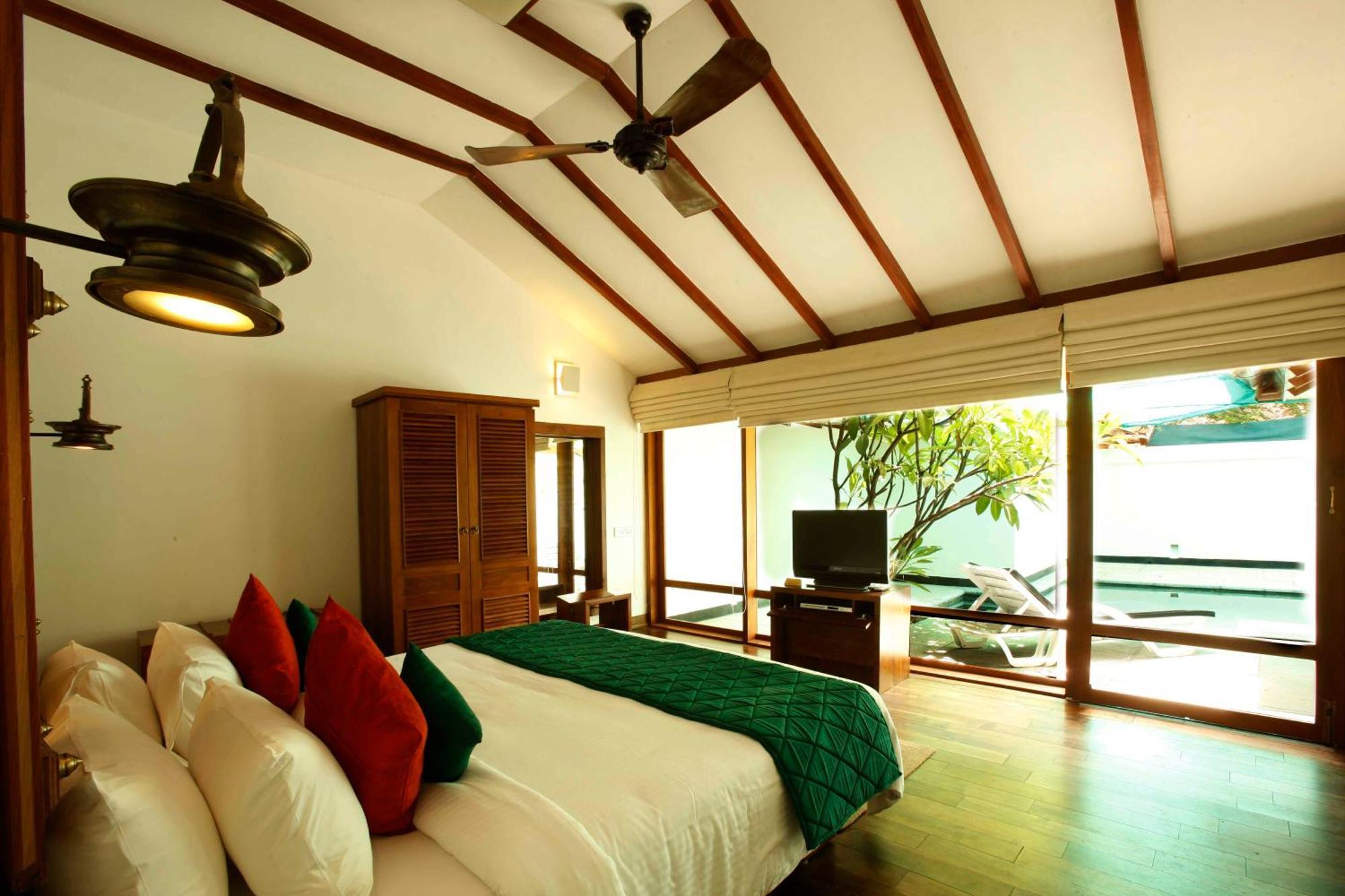 헤리티지 마두라이 호텔 객실 사진 A bedroom at the resort