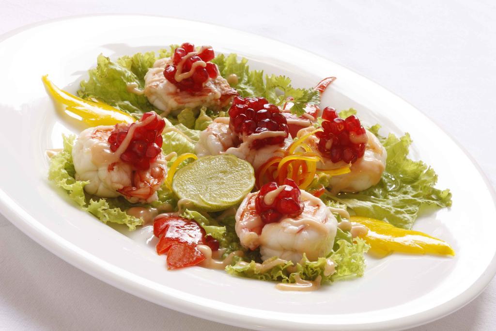 헤리티지 마두라이 호텔 외부 사진 A salad of scallops