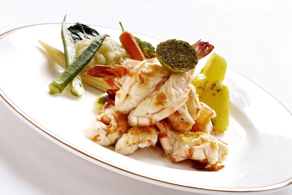 헤리티지 마두라이 호텔 외부 사진 A prepared crab